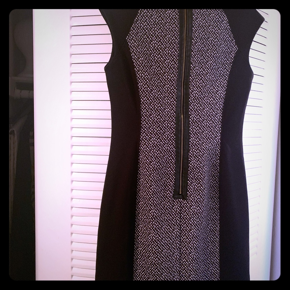 Calvin Klein size 4 dress. It’s chic and brand new